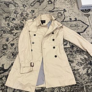 Banana Republic Coat size small color tan/beige with stripe white/blue lining.